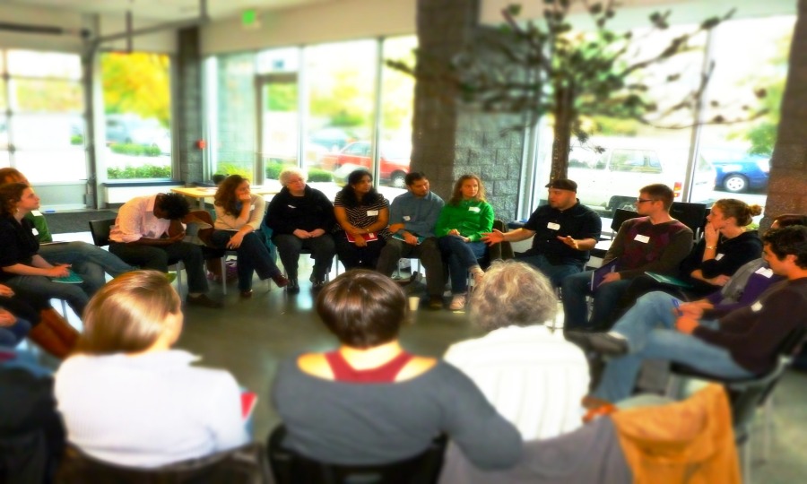 This image shows Adam F.C. Fletcher facilitating adult learners in Seattle, Washington.